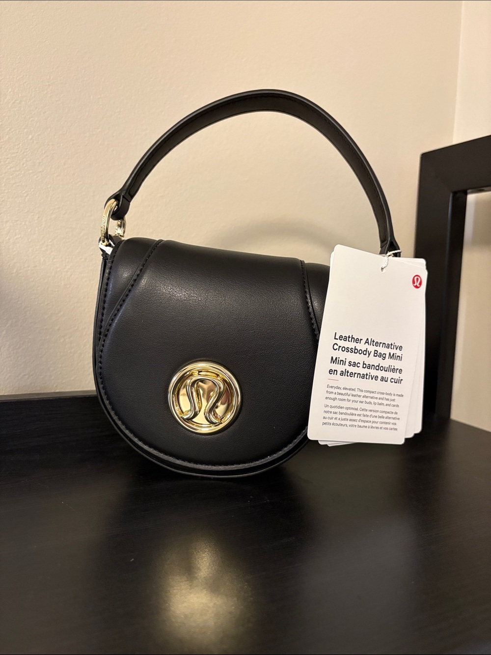 lululemon athletica Black Mini Leather-Alternative Crossbody with Gold Emblem